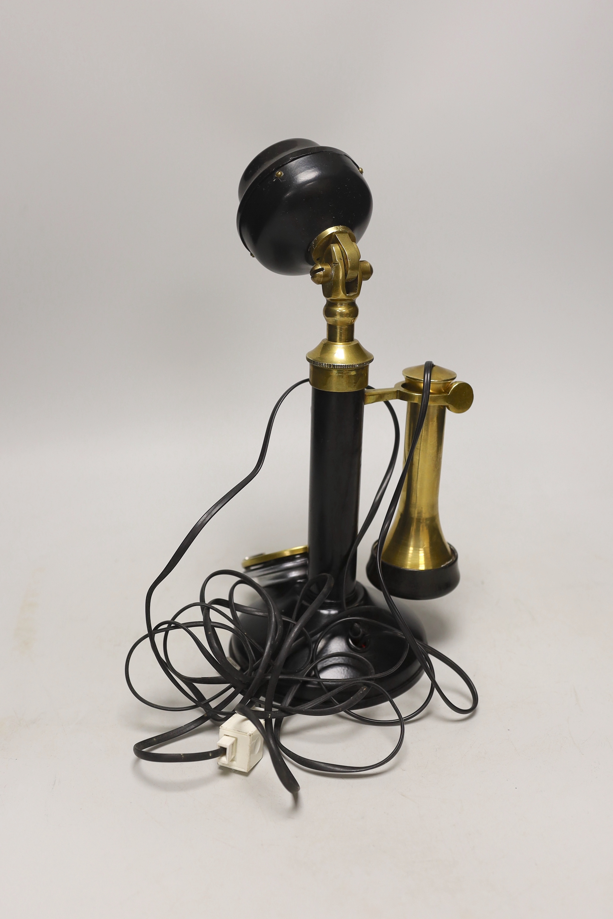 An early 20th century candlestick telephone